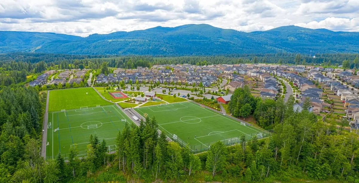 Snoqualmie Valley Trail paved cycling path with mountain views